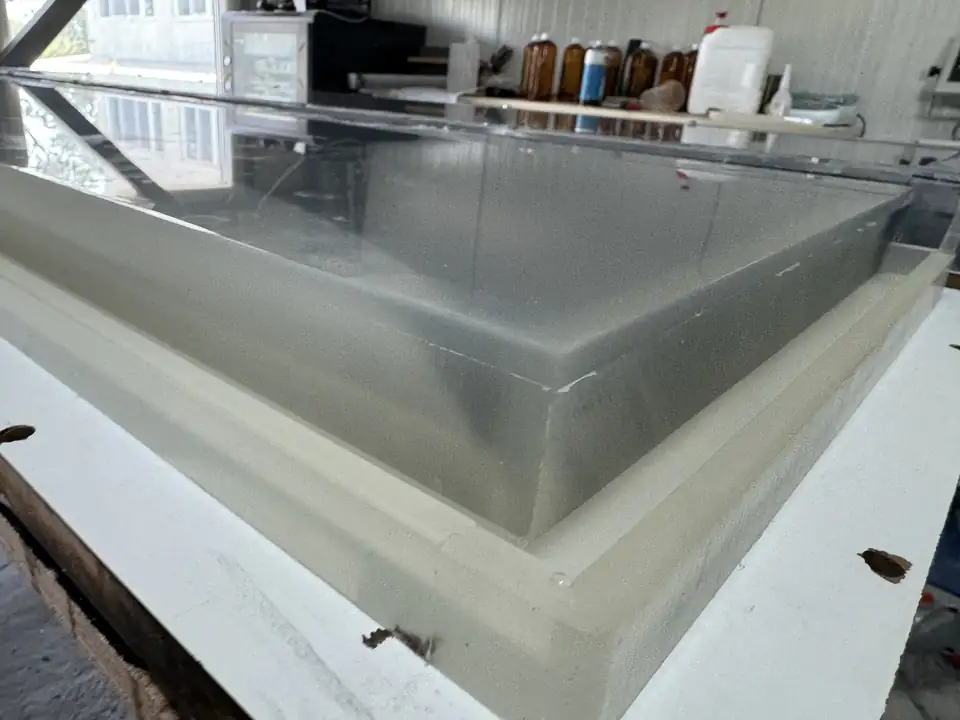 Finished transparent panel mould on a workbench