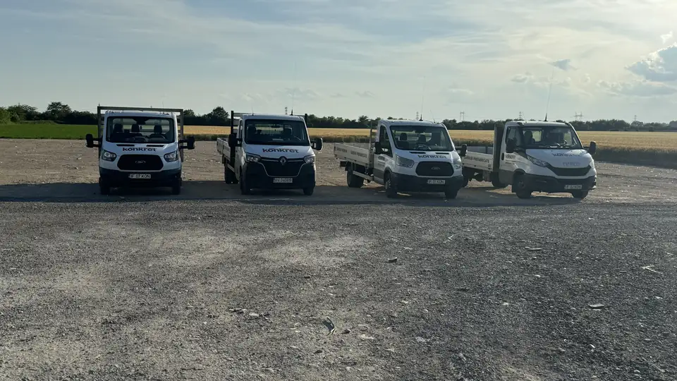 Konkret Line's four flatbed lorries — our own transport for deliveries